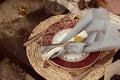 A table designed for a boho style event with an eucalyptus, vintage plates and other rustic touches. Royalty Free Stock Photo