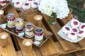 Table with desserts. fruit, bean, coffee, berries