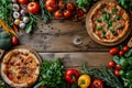 Two Topped Pizzas on a Table Royalty Free Stock Photo