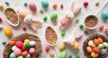 A table with easter eggs, bunny figurines, and sprinkles Royalty Free Stock Photo