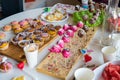 Table filled with home made birthday sweets. Royalty Free Stock Photo
