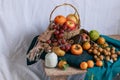 A table filled with twelve different round sweet fruits