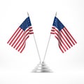 Table flag USA. Two national flags on metal flagpole stand isolated on white Royalty Free Stock Photo