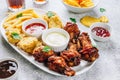 Table fof tasty snacks for beer prepared for watching sports on TV. Royalty Free Stock Photo