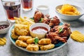 Table fof tasty snacks for beer prepared for watching sports on TV. Royalty Free Stock Photo