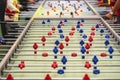 Table football game, soccer close-up and hands of people, selective focus. Soccer table with red and blue plastic Royalty Free Stock Photo