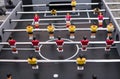 Table football game. Soccer table with red and yellow players. Royalty Free Stock Photo