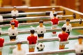 Table football game with yellow and red players and white goalkeeper. Table soccer game. Social and emotional development of Royalty Free Stock Photo