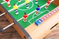 Table football game with yellow and red players and white goalkeeper Royalty Free Stock Photo