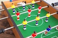 Table football game with yellow and red players and white goalkeeper Royalty Free Stock Photo