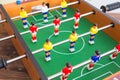 Table football game with yellow and red players and white goalkeeper. Table soccer game. Royalty Free Stock Photo