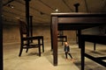 Table and Four Chairs is a multi-part sculpture of a dining room set