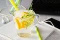 Fresh lemonade, laptop and mobile phone Royalty Free Stock Photo