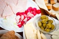 Table with fresh vegetable, cheese and ham