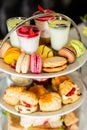 Table full of different appetizing desserts in the restaurant