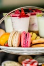 Table full of different appetizing desserts in the restaurant