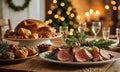 A table full of food is set for a holiday meal. The table is decorated with a Christmas tree in the background and a wre