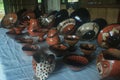 A table full of home made ceramic bowls, a typical design of the mockawas in the amazon of Ecuador