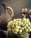 Grapes and wine in a jug and glasses Royalty Free Stock Photo