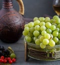 Grapes and wine in a jug and glasses Royalty Free Stock Photo