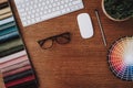 Table. Glasses. Laptop Keyboard. Mouse and Pencil.