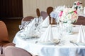 Table with glasses and napkins served for dinner in restaurant Royalty Free Stock Photo