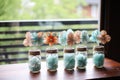 a table of handmade baby shower centerpieces
