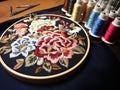 On the table, hoop, overfinger to embroider motifs