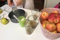 On the table are ingredients and tools for making charlotte. Autumn pie with apples