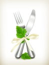 Table knife and fork with parsley