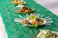 Chicken Satay grilled on Bamboo Sticks, typical Thai or Indonesian Food