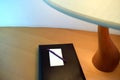 Table Lamp beside the book with Pencil Royalty Free Stock Photo