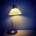 Table lamp in a dark room