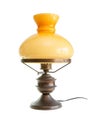 Table lamp stylized as antique oil lamp isolated