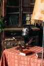 On the table lies the pilot`s helmet, a toy airplane made of wood Royalty Free Stock Photo