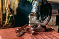 on the table lies the pilot's helmet, a toy airplane made of wood