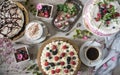 Table with loads of cakes