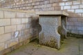 Table made of stone. End view. Background with copy space for text Royalty Free Stock Photo