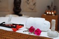 Table with massage accessories and crystal and butterfly decorations Royalty Free Stock Photo