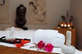 Table with massage accessories and crystal and butterfly decorations Royalty Free Stock Photo