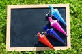 Table is in the meadow with school bags, school day Royalty Free Stock Photo