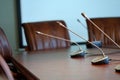 Table microphones at the conference hall Royalty Free Stock Photo