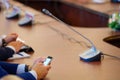 Table microphones at the conference hall Royalty Free Stock Photo