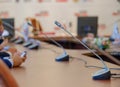 Table microphones at the conference hall Royalty Free Stock Photo