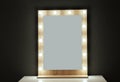 Table with mirror near color wall. Dressing room Royalty Free Stock Photo