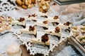 Table with muffins, cakes, sweets, candy, buffet. Dessert table for a party goodies for the wedding banquet area. Close up. candy Royalty Free Stock Photo