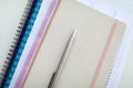 On table is notebook and silver pen closeup Royalty Free Stock Photo