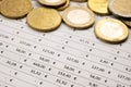Table with numbers, Euro amounts, calculator, and coins. Royalty Free Stock Photo