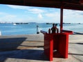 Table with offerings on the porch of a temple in Chew Jetty, the floating town of Georgetown, Malaysia