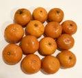 A table of orange mandarines rest in citrus glory